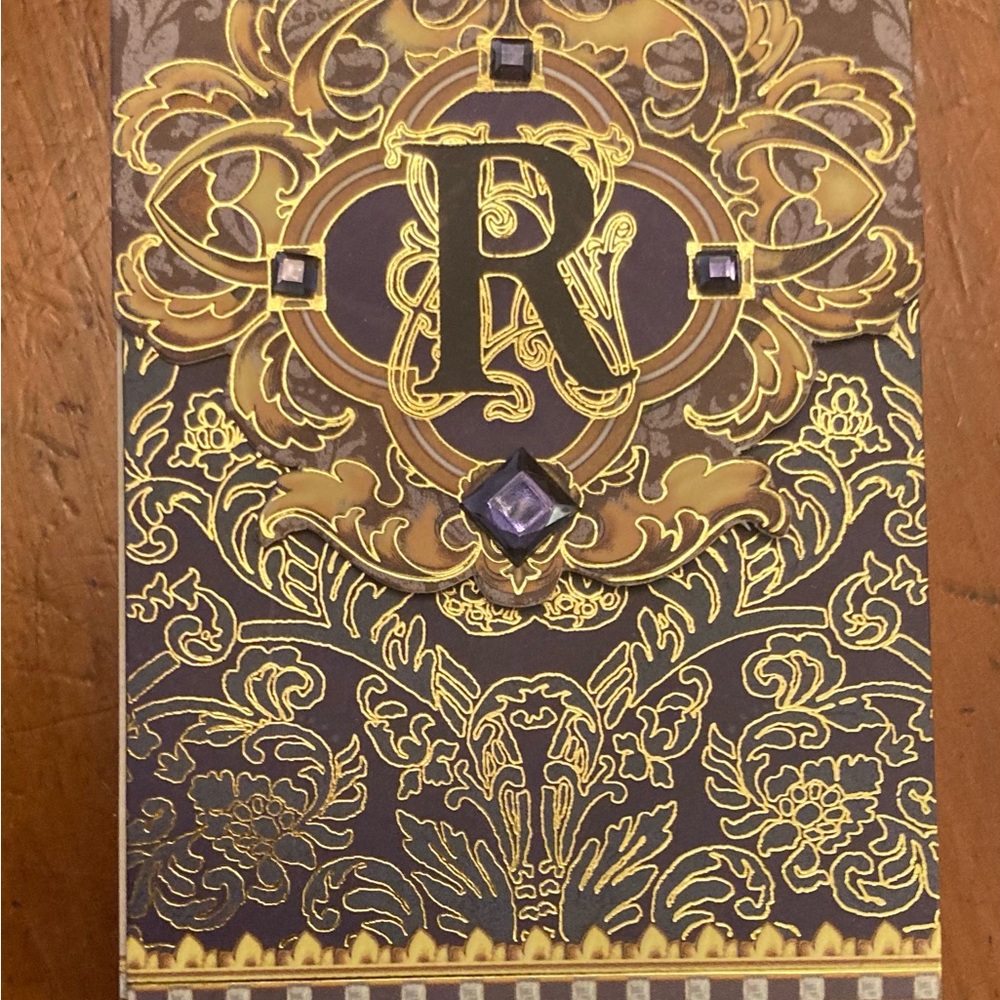 Note pad with R initial stone, medieval pattern gold black